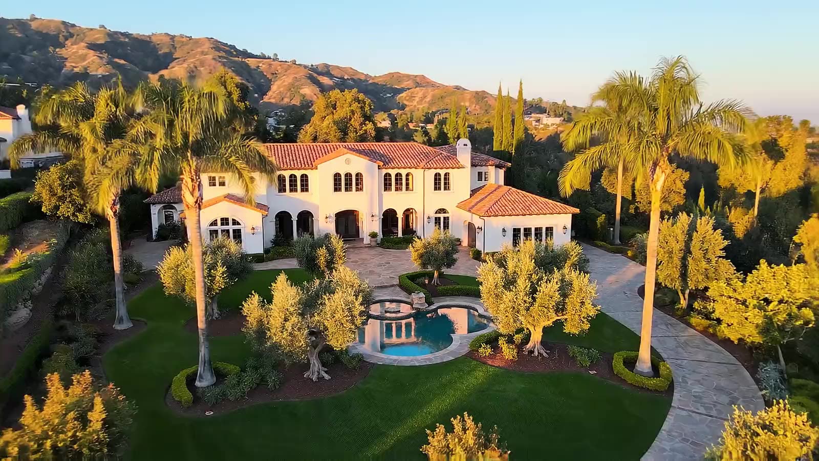 Aerial drone view of a Southern California home at golden hour